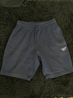 Tmavě modré teplákové kraťasy Reebok