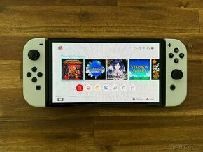 Nintendo Switch OLED, bílá + účet (20 her)