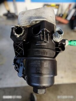 Domeček olejového filtru motory 1.6TDI a 2.0TDI.