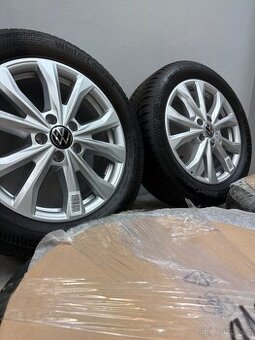 Alu Kola Vw Caddy Nové 215/55/17 zimní komplet Org.Vw