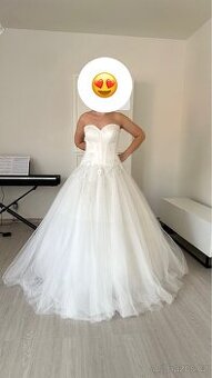 Č.008 Svatební šaty nové vel L-XL