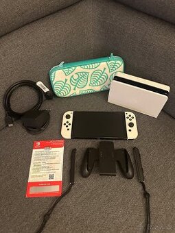 Nintendo Switch OLED + příslušenství a hra (top stav)