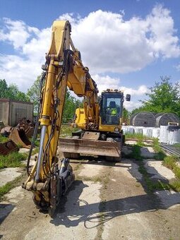 Kolový bagr Komatsu PW 180