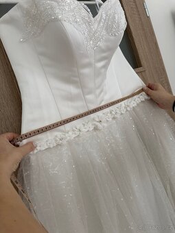 Č. O09 Svatební šaty nové vel L-XL