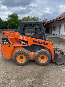 Smykový nakladač KOMATSU - 1