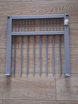 Výsuvný držák na kalhoty