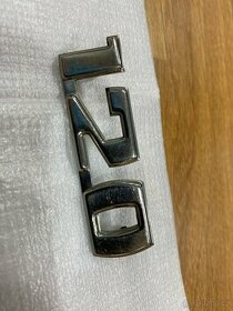 ŠKODA 120 - Znak kovový na zadní spojler, ORIGO, NOVÝ - 1