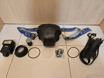 Prodám fotoaparát Praktica PLC 3 + příslušenství