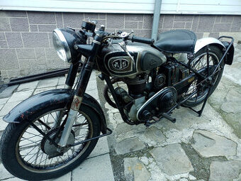 AJS