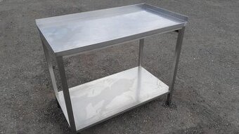 Nerezový stůl 110x60x90 cm se sp. polici a zadním lemem