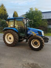 New Holland TL 100A.