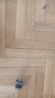 držák na šňůru od žehličky