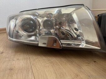 Přední světlomety Škoda Superb 1