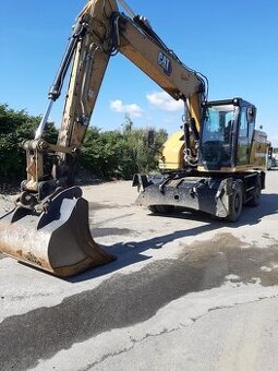 Kolový otočný bagr CAT M318