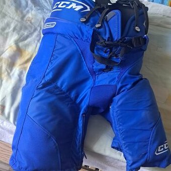 Prodám hokejové kalhoty CCM – velikost Junior L  66–71 cm