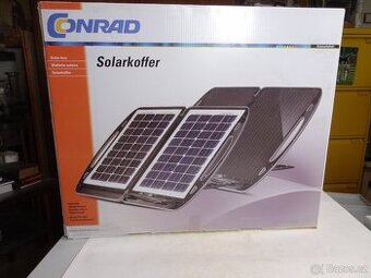 Solární nabíječka autobaterií v kufru. CONRAD