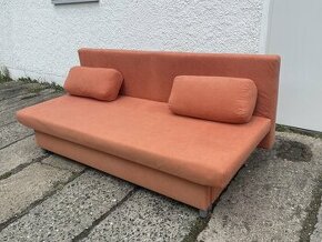 Oranžový rozkládací gauč s úložným prostorem