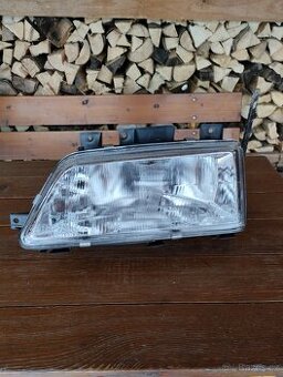 Světlomet Peugeot 405 LP nový - 1