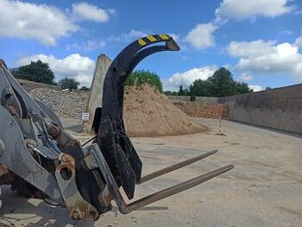 Přidržovač kulatiny