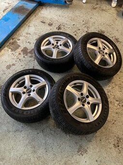 Litá kola RONAL 6.5J x 16H2 ET 45 + celoroční pneu Tomket - 1