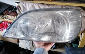 Přední světlo Kia Carnival 2003