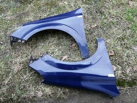 Opel Astra H pravý přední blatník