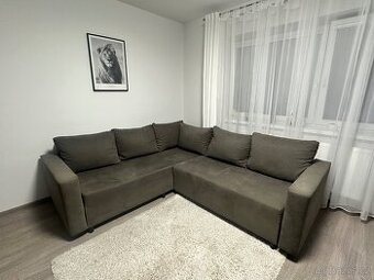 Šedý rozkládací gauč 225x250
