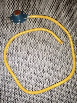 Regulátor tlaku plynu pro propan-butan (typ RTP 21).