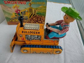 Starožitná plechová hračka, buldozer