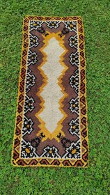 Ručně tkané koberce TAPICO na kanavě