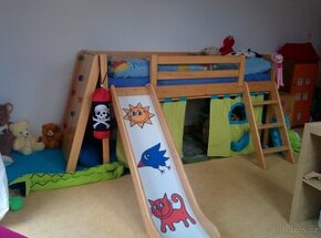 Zvýšená dětská postel Domestav s příslušenstvím