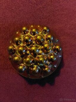 Designový svícen ve tvaru formy na bábovku