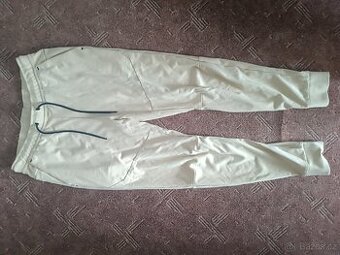 Kalhoty (tepláky) vel.M Zn. Nike tech fleece