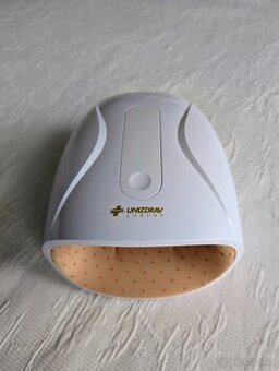 Masážní strojek na ruce Unizdrav