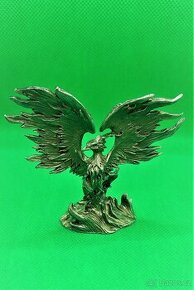 sbírka kovových figur draků
