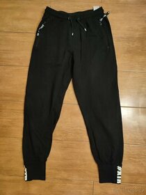 Tepláky chlapecké v perfektním stavu.Velikost 158/164