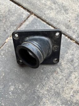 Příruba karburátoru Husqvarna CR,WR,WRE