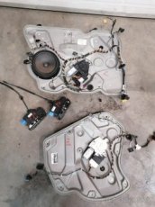 Stahovačky zámky dveří Škoda Octavia II