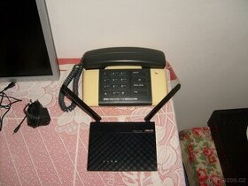 ROUTER  ASUS ZA  200KČ