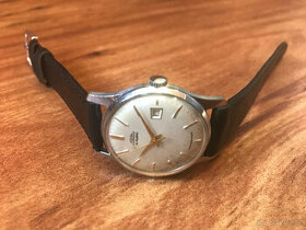 Výjimečné starožitné mechanické hodinky Prim Datumatik 1964