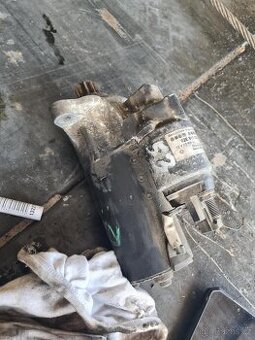Startér Bosch 02E911023HX
