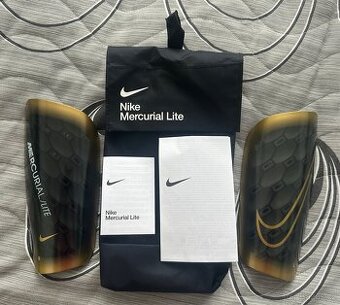 Chrániče Nike Mercurial Lite - M - zlatočerné