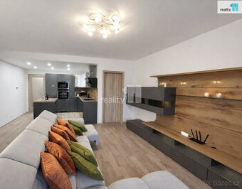 Byt  3+kk s dvěma balkóny, jedním parkovacím stáním v garáži