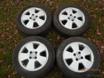 4xOriginál Obutá Litá kola s letními pneu na OPEL 15tky.ET49
