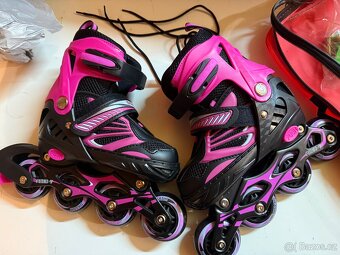 Rostoucí dětské kolečkové brusle růžové