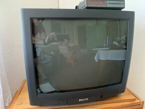 Stará televize Philips a video.