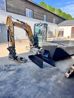 Posypavač krajnic,stranový finišer krajnic