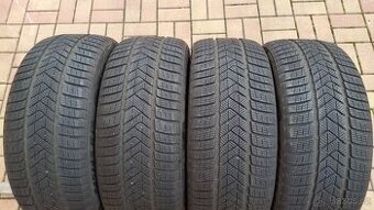 Zimní pneumatiky PIRELLI 245/45 R19 102V XL 4x7,5mm r.2023