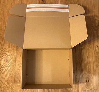 Poštovní krabice s lepícím proužkem