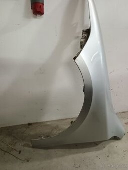 Levý blatník Superb 2 - 1